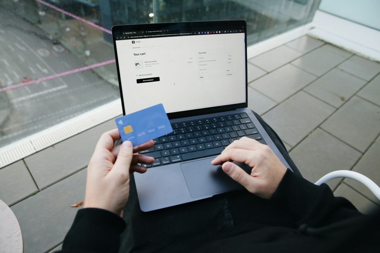 White-labeled business automation and client management platform built for yoga instructors, wellness studios, and hybrid service providers. 6 A person sitting in a chair with a laptop and a credit card